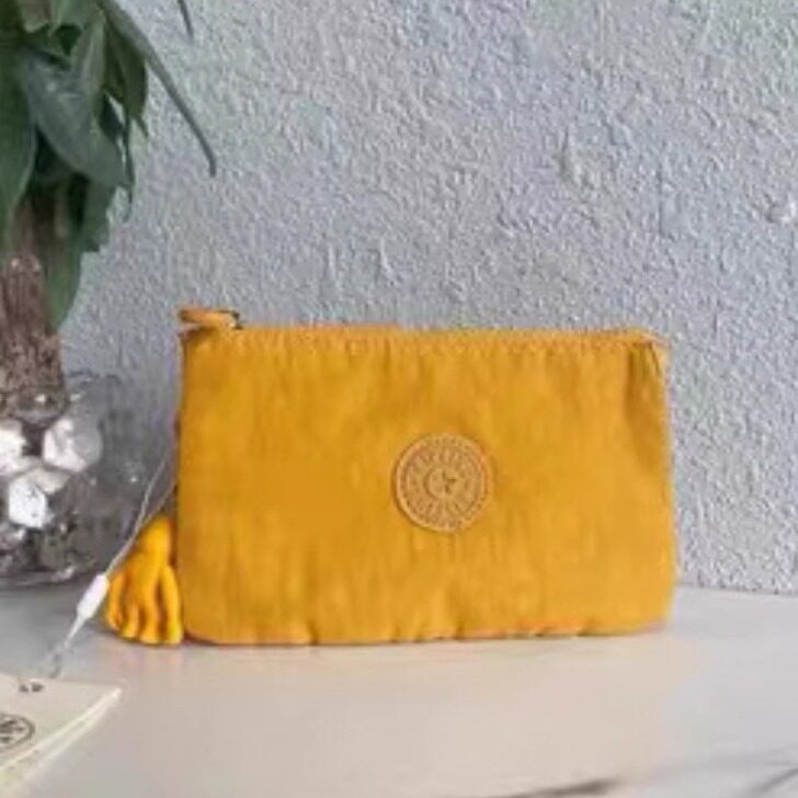 Kipling凯普林时尚休闲手拿包零钱包手机包猴子包三层女包K13265