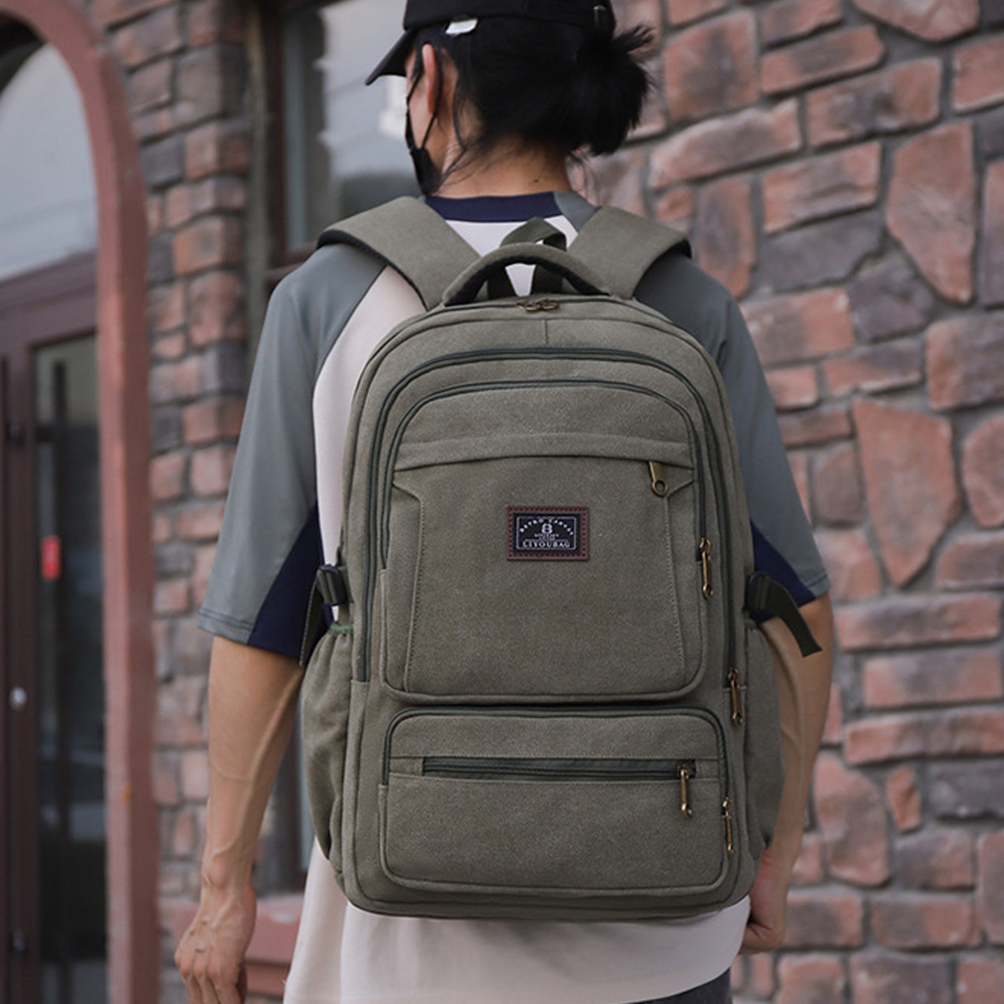 多层大容量双肩包男士外出打工行李背包耐磨帆布旅行包复古登山包