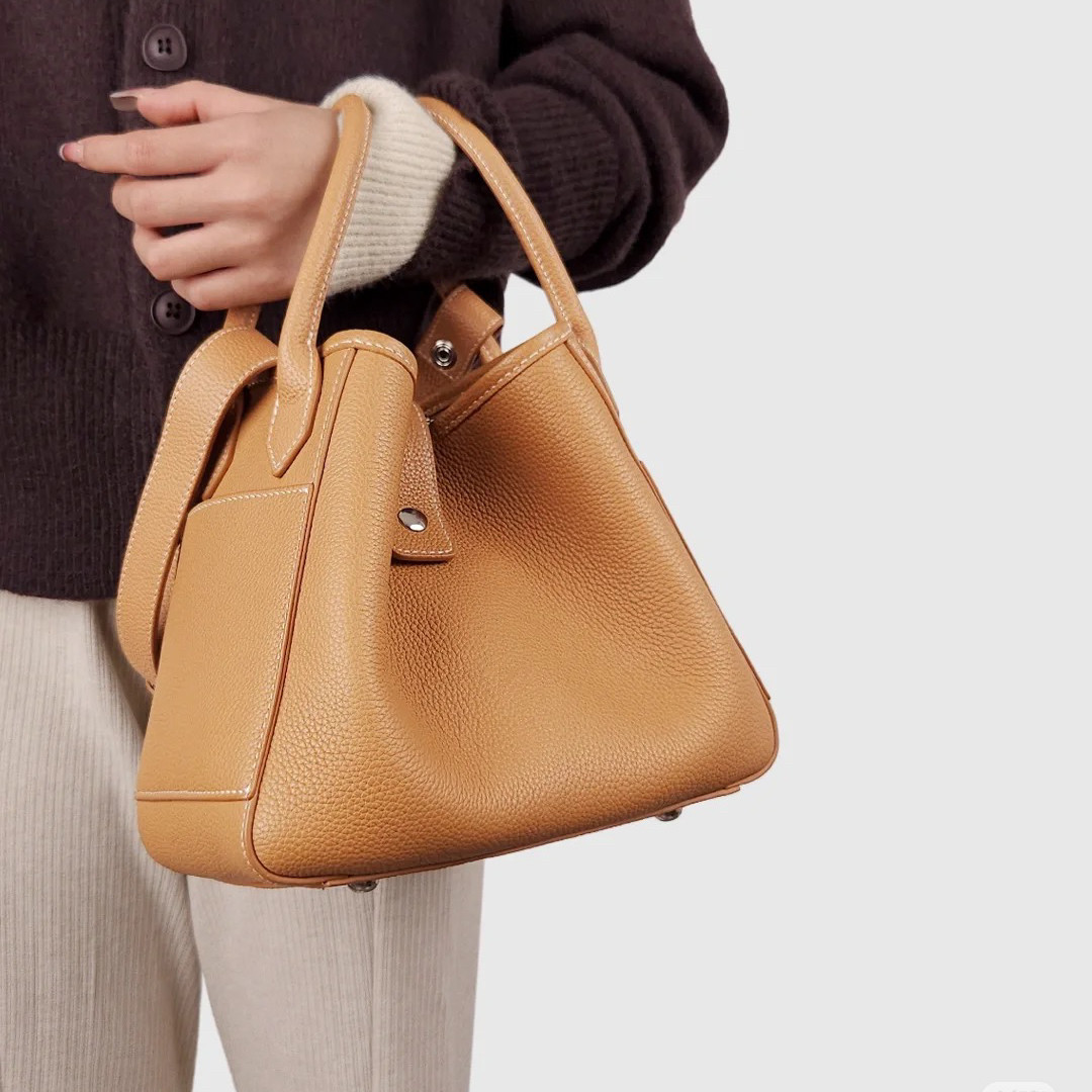 真皮女包新款个性小众设计水桶包头层牛皮女包软皮气质单肩斜挎包,箱包皮具/热销女包/男包,水桶包,淘宝优惠券,粉丝福利购,淘宝优惠卷