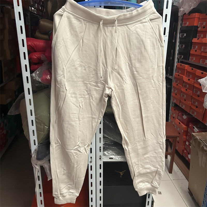 耐克 NIKE YOGA 女子收脚秋冬加薄绒运动休闲针织长裤 DN0937-104