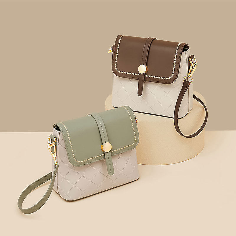 金狐狸拼色包包女2025新款高级感真皮百搭牛皮包手机休闲单肩小包