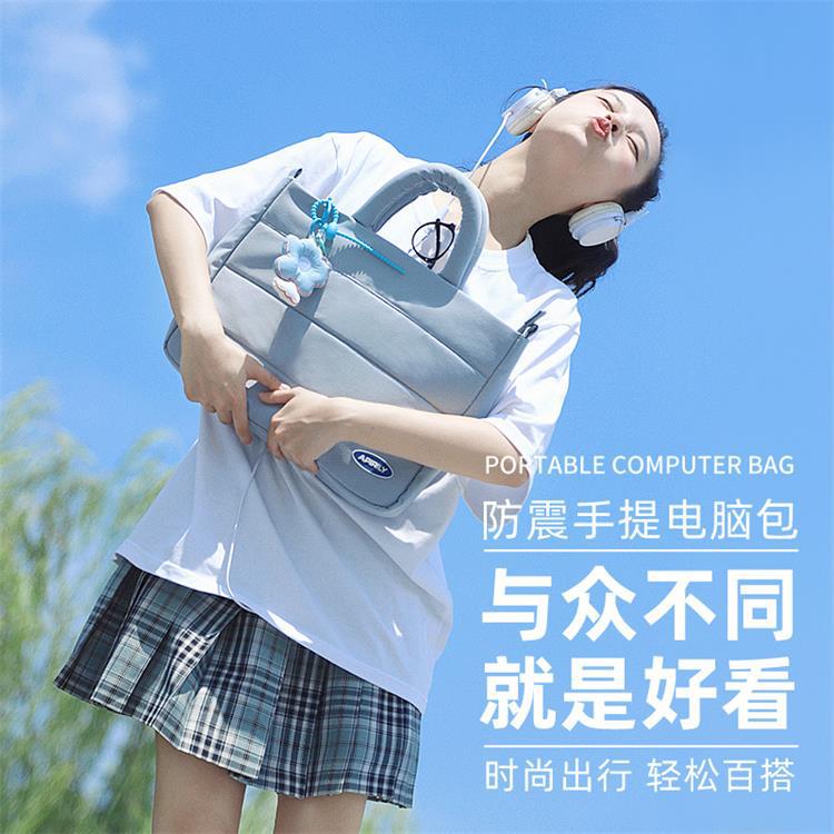 新品手提电脑包isn网红大容量学生休闲女士包外出手提可爱挂件