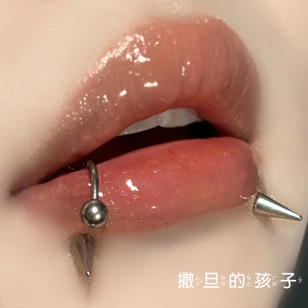 SATANS CHILD HIN OUT THE EFFECT OF THE LIP STUD LIP RING HORSESHOE RING SWEET COOL EAR BONE STUD DIMPLE NAIL PIERCING