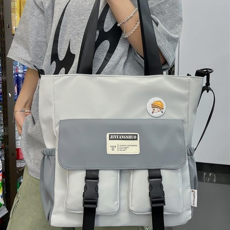 日系潮酷斜挎包百搭运动风男学生上课补习背包大容量单肩手提包袋