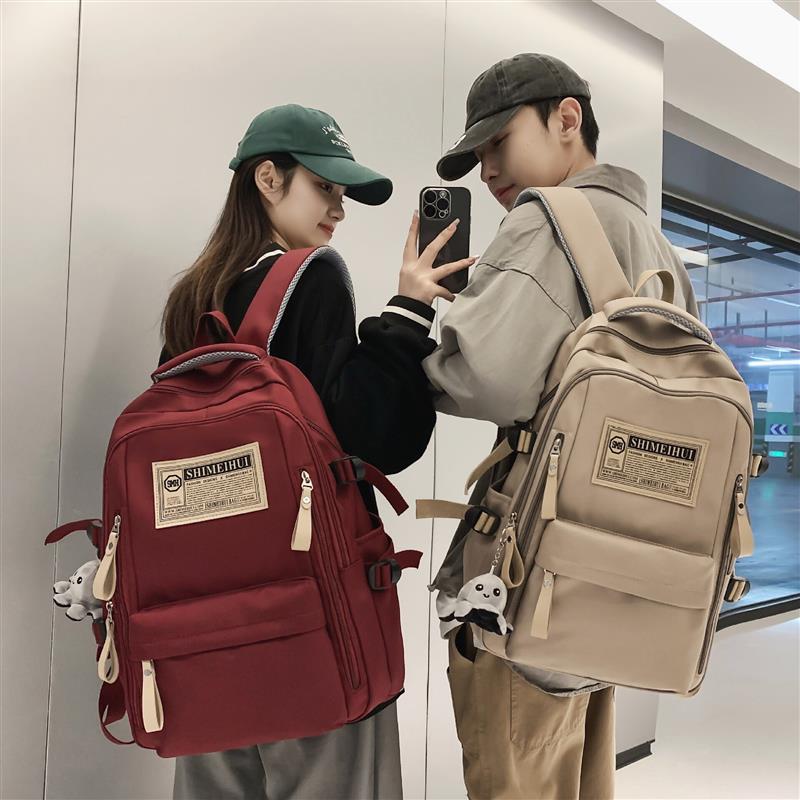 2023新款双肩包男潮酷涂鸦初高中学生书包女大容量情侣校园背包