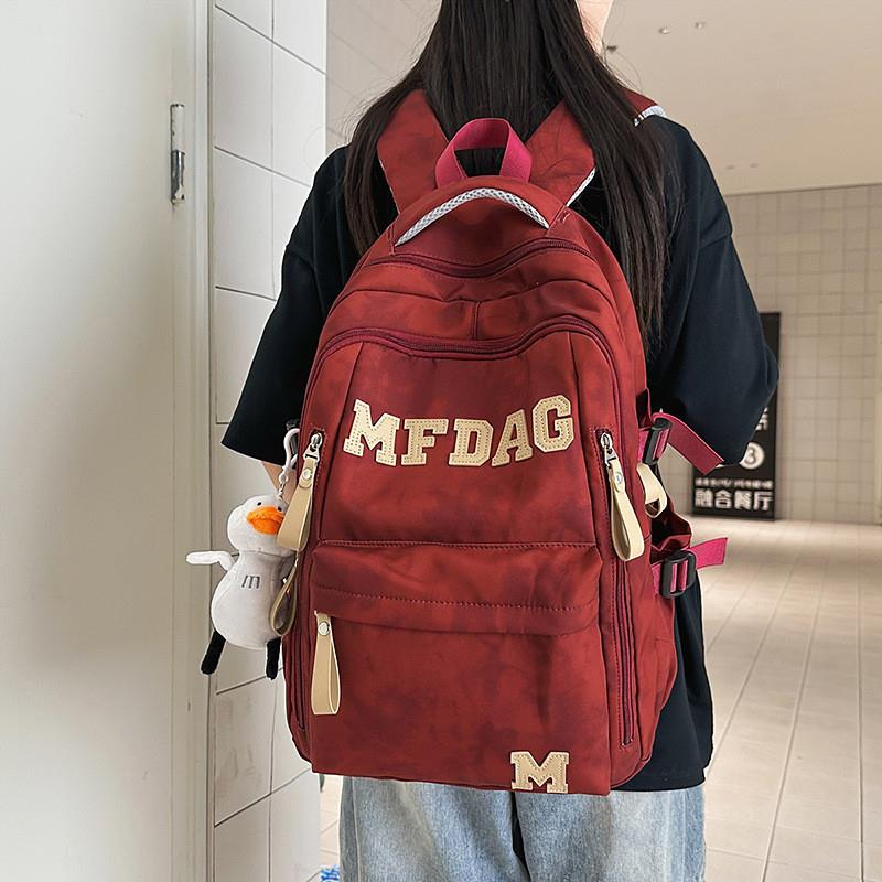 新款学院风字母轻便双肩包初中高中学生书包女大容量旅行背包