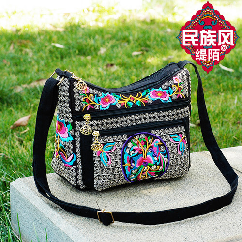 新款民族风刺绣花帆布简约饺子包
