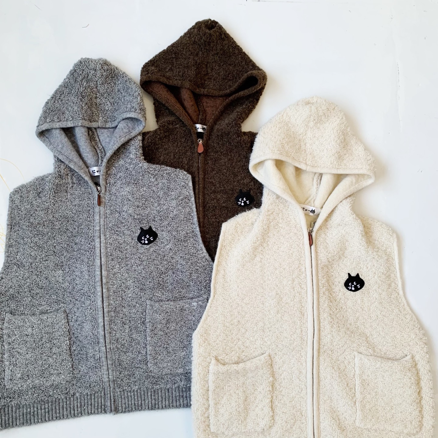 日系25秋冬新品惊讶猫咪毛绒连帽拉链针织毛衣叠穿坎肩女上衣