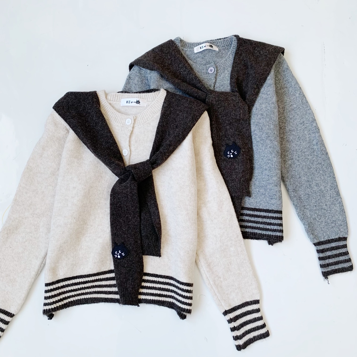 日系25秋冬新品惊讶猫咪披肩袖口条纹针织毛衫毛衣二件套女