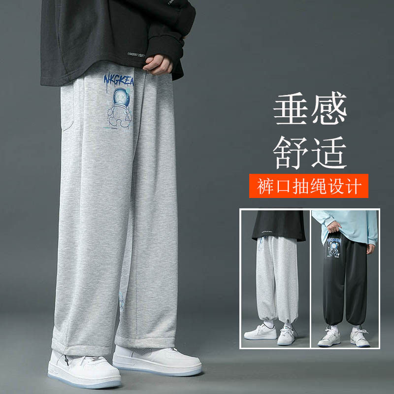 秋季宽松休闲裤男运动裤抽绳束脚裤太空人印花卫裤坠感直筒阔腿裤图片