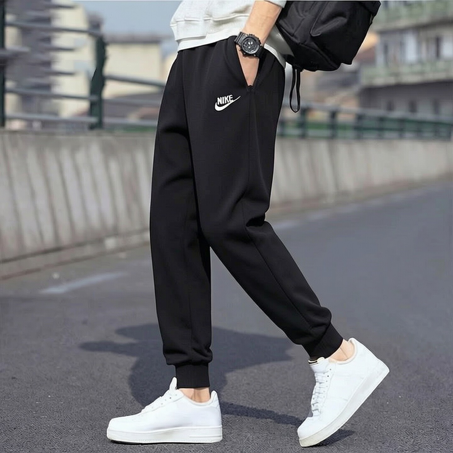 Nike耐克裤子针织棉质运动裤新款男子束脚裤刺绣休闲长裤保暖卫裤