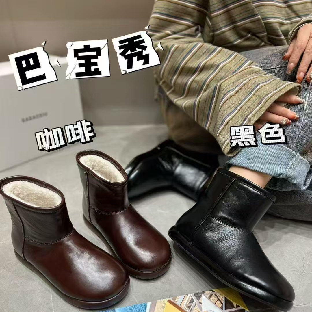 断码秒杀雪地靴女防水冬季短筒女靴平底时尚加绒保暖厚底牛皮棉靴