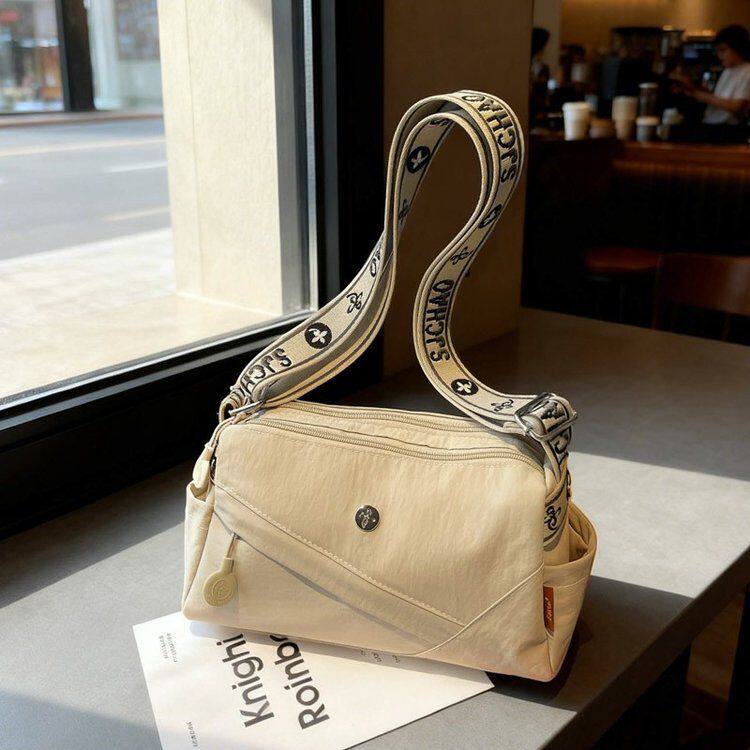 手机包女斜挎2024简约小巧超轻高级感小众百搭精致新款水桶小包包