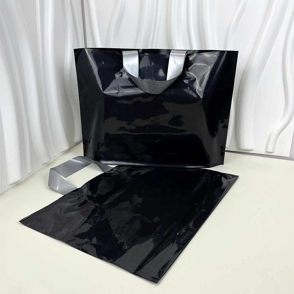 新款加厚16丝纯黑色塑料手提袋男服装购物袋礼品包装袋子支持印刷