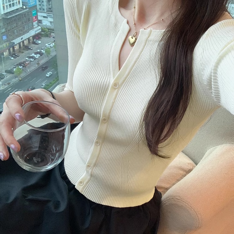 设计感单排扣半袖修身针织开衫女2025春夏新款不规则气质时尚上衣