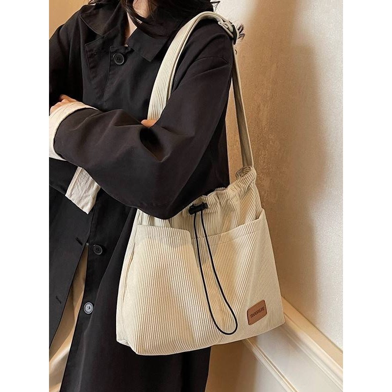 官方品牌秋冬季新款复古条绒托特包女大容量通勤单肩包轻便松弛感,箱包皮具/热销女包/男包,时尚帆布包,淘宝优惠券,粉丝福利购,淘宝优惠卷