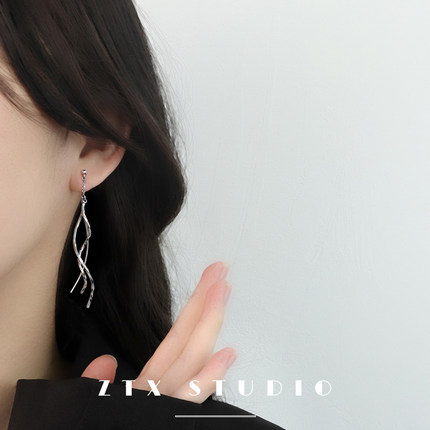 交错流苏耳夹无耳洞女新款小众设计感高级感耳饰长款蚊香盘耳环夹