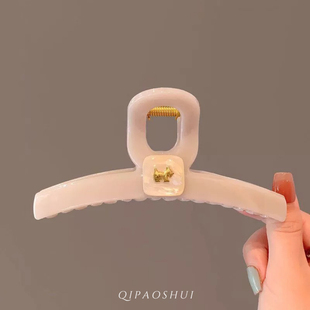 高级感藕粉色小狗抓夹女2025新款鲨鱼夹发夹后脑勺盘发夹子发饰夏