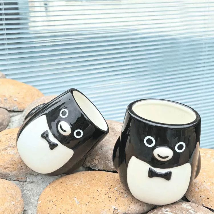 可爱卡通企鹅立体手握陶瓷杯