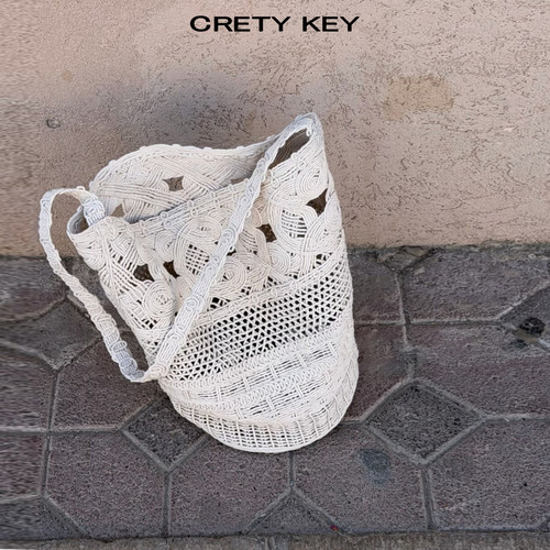 手工编织镂空托特包女海边度假风沙滩包大容量休闲手提单肩水桶包