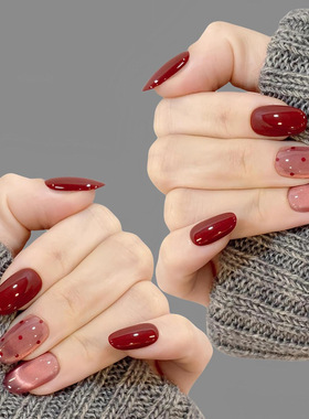 新年车厘子色猫眼纯手工穿戴甲精品短款红色波点显白椭圆圣诞美甲