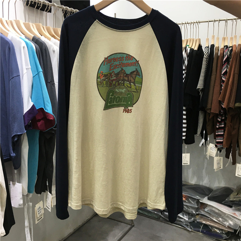 2%拼色插肩袖印花圆领长袖T恤女