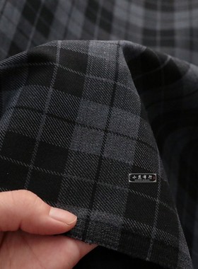 春秋款黑灰色弹力斜纹精纺毛涤色织格纹布料西装套装高档时装面料