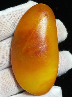 已售63.8克新疆和田玉黄沁皮籽料原石把件完整一口气形好毛孔清晰