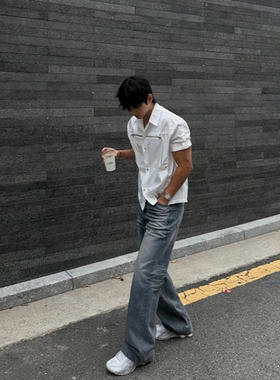 韩国代购刷白猫须油印喇叭牛仔裤