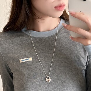 韩系银色马鞍包长款吊坠项链女轻奢高级感复古简约挂脖毛衣链配饰