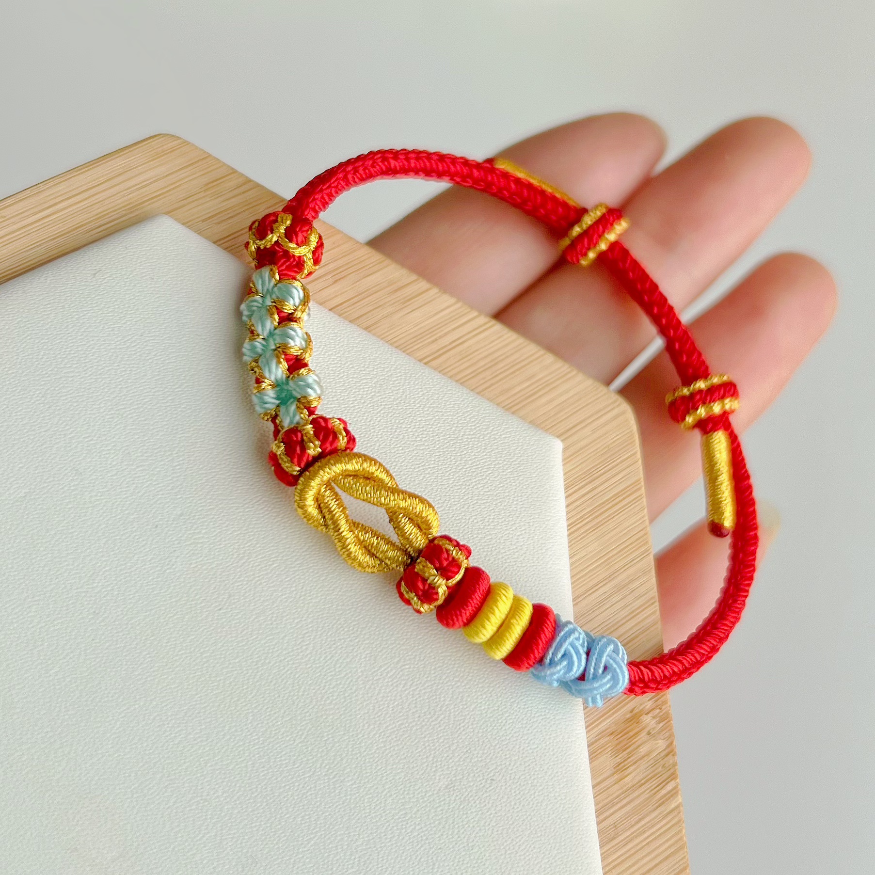 手工编织桃花线圈手绳半成品可穿饰品黄金新年礼物兔年红绳手链