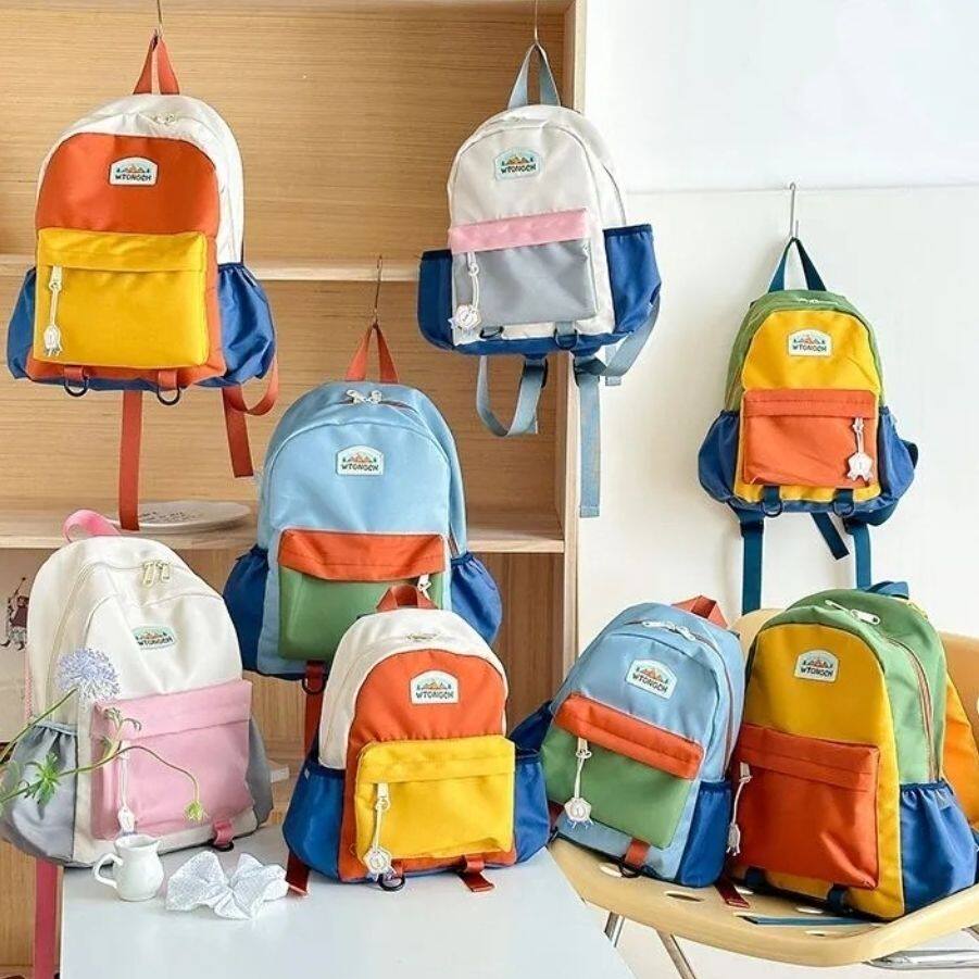 大中小号拼色幼儿园书包潮男童韩版女童轻便双肩包小学生出游背包