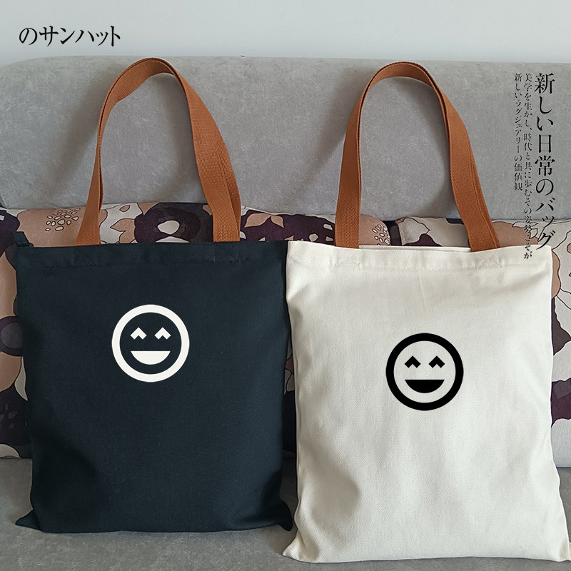 日系潮流高品质笑脸印花帆布包袋