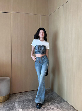 NancyCavally修腿磨破微喇牛仔裤
