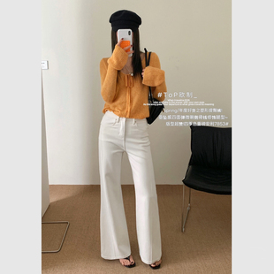 TOP欧制白色牛仔裤女2026年早春新款鱼骨边设计修身显瘦微喇裤子