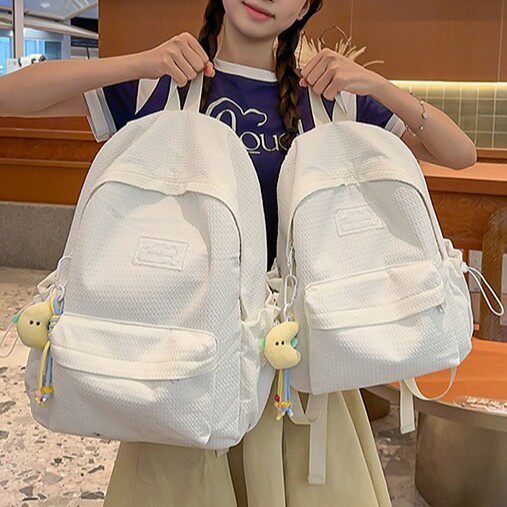轻便旅行大容量背包日常通勤书包