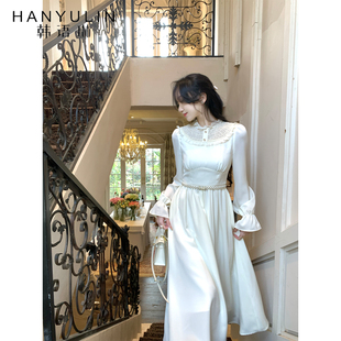 韩语琳 法式宫廷风米白色连衣裙女2026春蕾丝立领泡泡袖大摆长裙