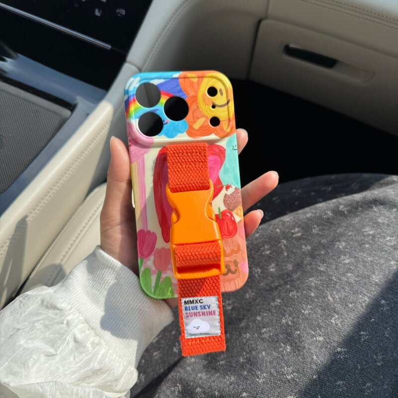 ins夏日橙色涂鸦笑脸适用苹果17 pro max手机壳腕带iPhone16 15 13彩色线条14支架防摔小众设计创意缝线