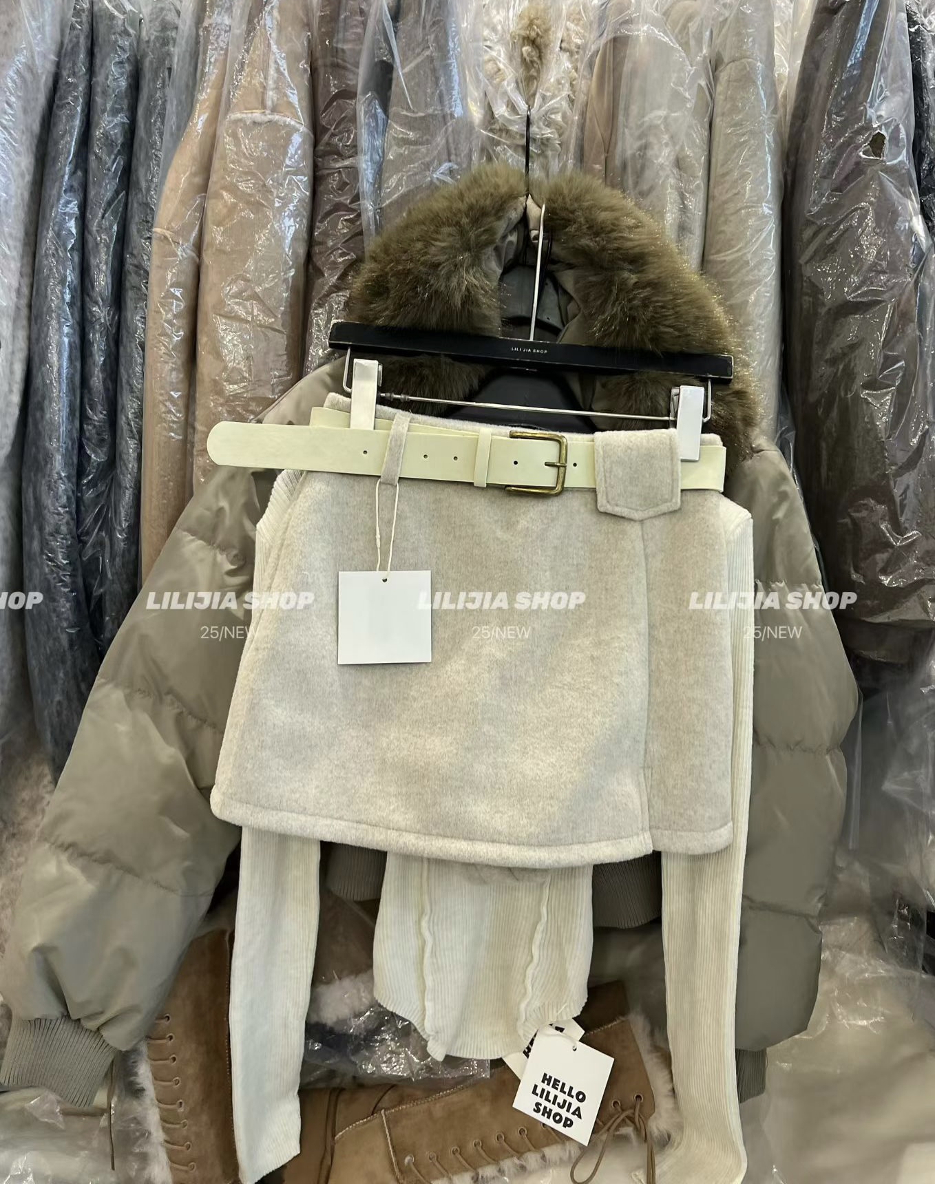 Miss家 2025冬季新款时髦洋气百搭显瘦高腰配腰带A字毛呢半身裙女