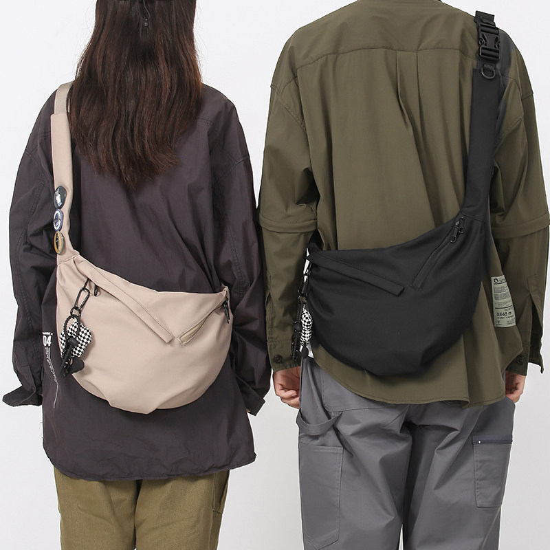 斜挎包男单肩包女大容量通勤包