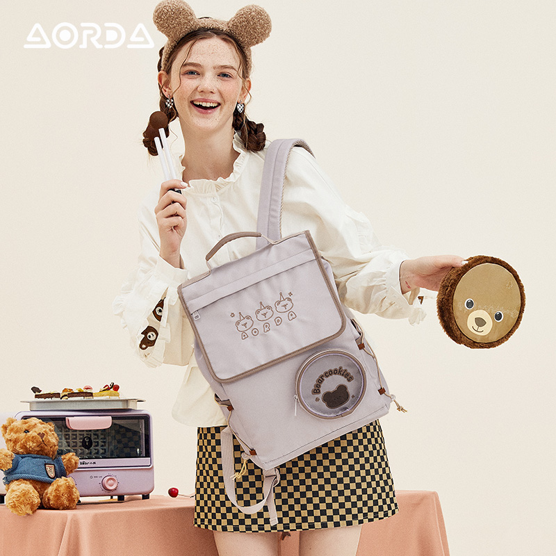 AORDA小熊饼干 痛包大容量电脑包书包初中女生双肩包