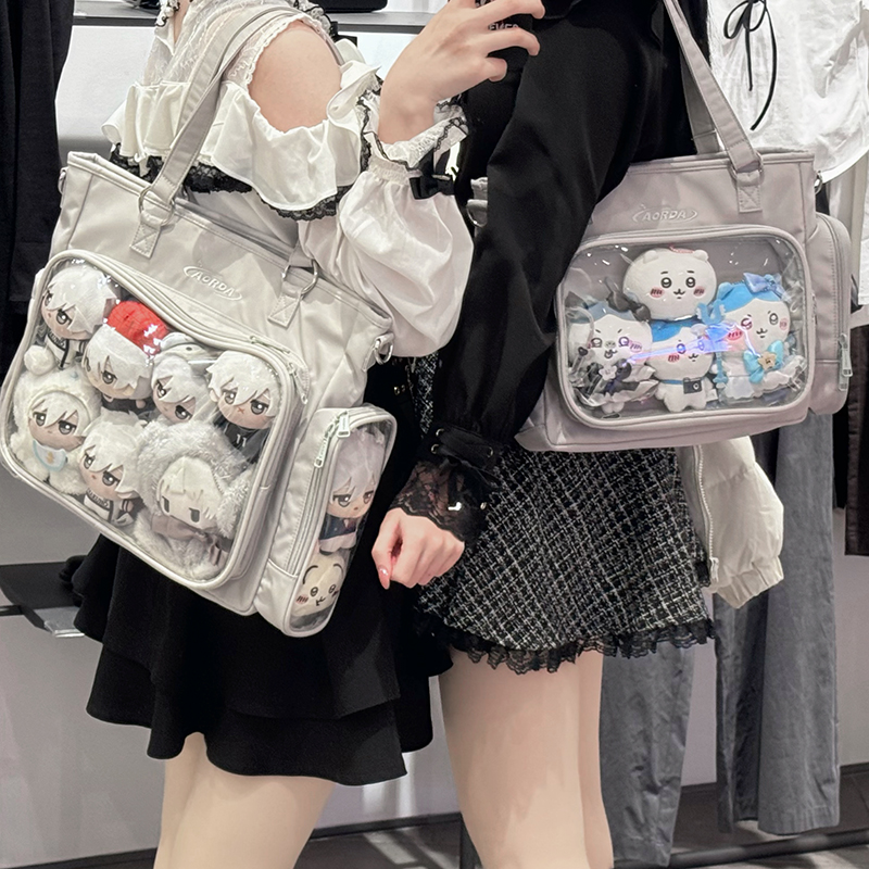 AORDA 痛包双肩20cm娃包学生党通勤二次元单肩斜挎追星三用吧唧包