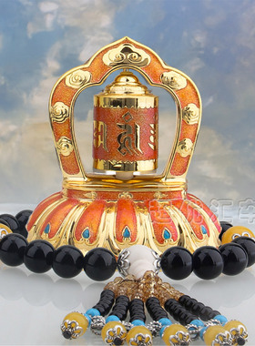 橙色彩绘合金车内工艺品藏式旋转摆件双功能太阳能平安祝福新款