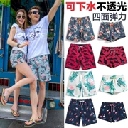 Tide thương hiệu quần đi biển quần nam nhanh khô quần lỏng người yêu quần short quần bơi nữ kỳ nghỉ bên bờ biển phù hợp với quần bơi - Quần bãi biển