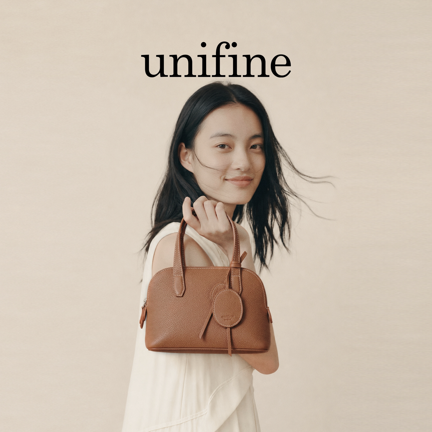 unifine拾月手提贝壳包图片