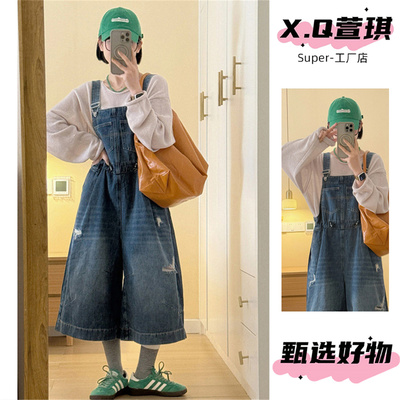 深蓝色做旧破洞牛仔背带裤女早春