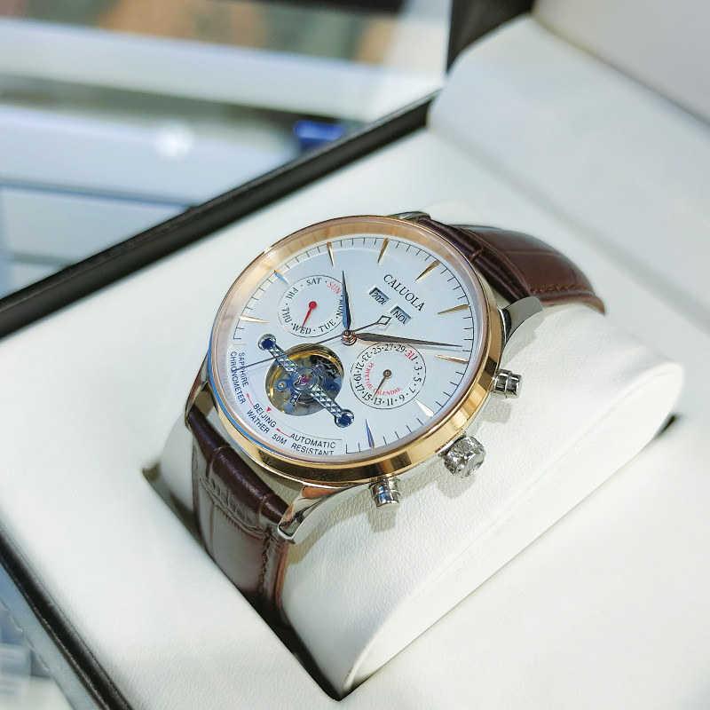 卡罗莱手表品牌十大品牌手表男机械表全自动防水镂空皮带潮流男表