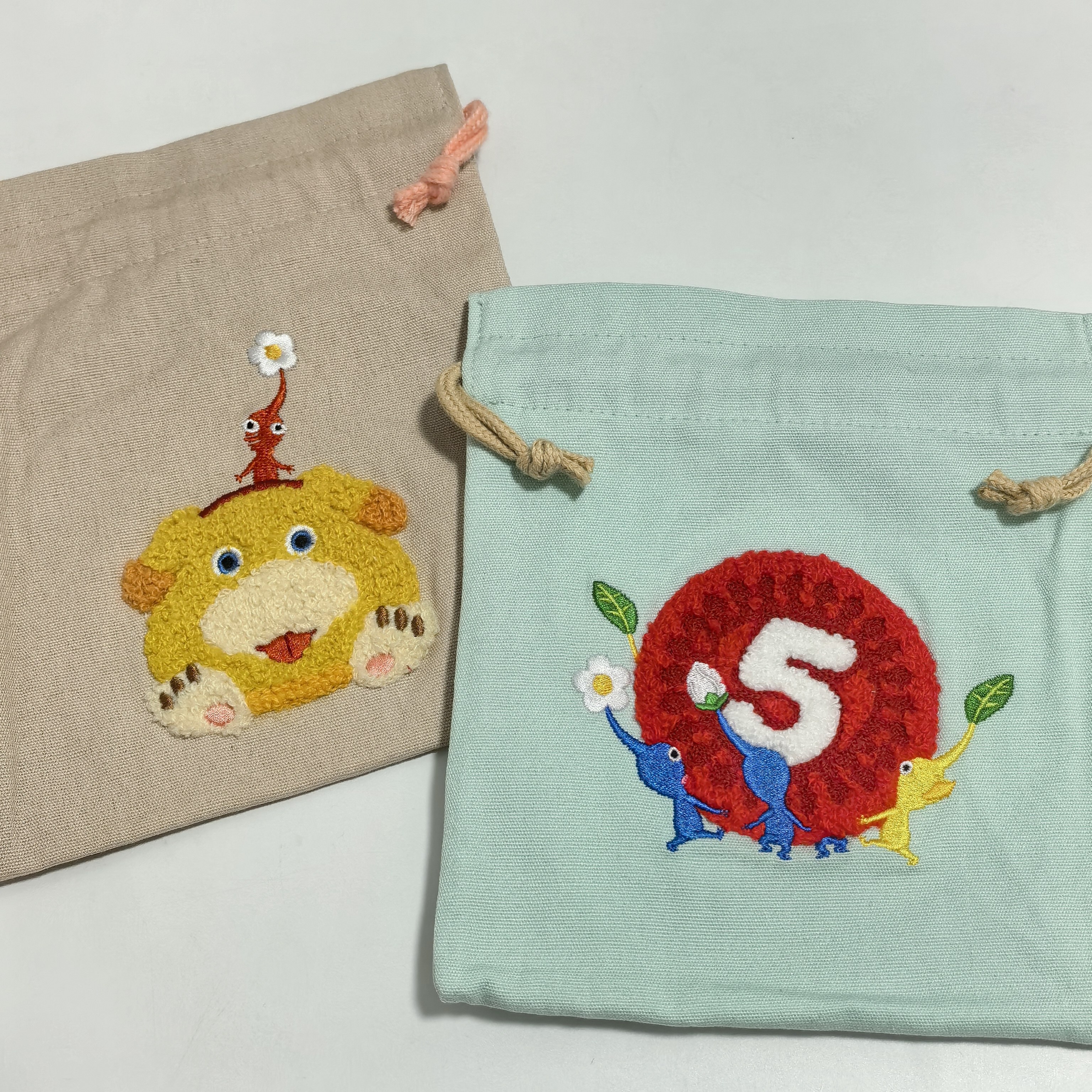 日单 可爱卡通皮克敏刺绣束口袋 化妆包 收纳包