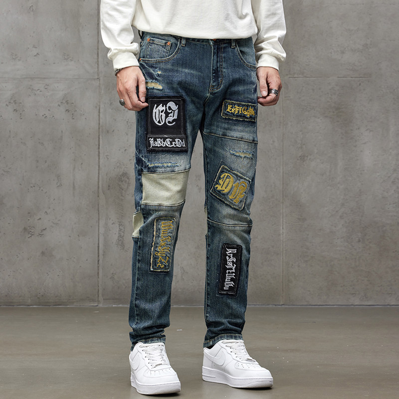 重工刺绣补丁贴布拼接牛仔裤男士秋冬季痞帅修身直筒机车长裤子潮