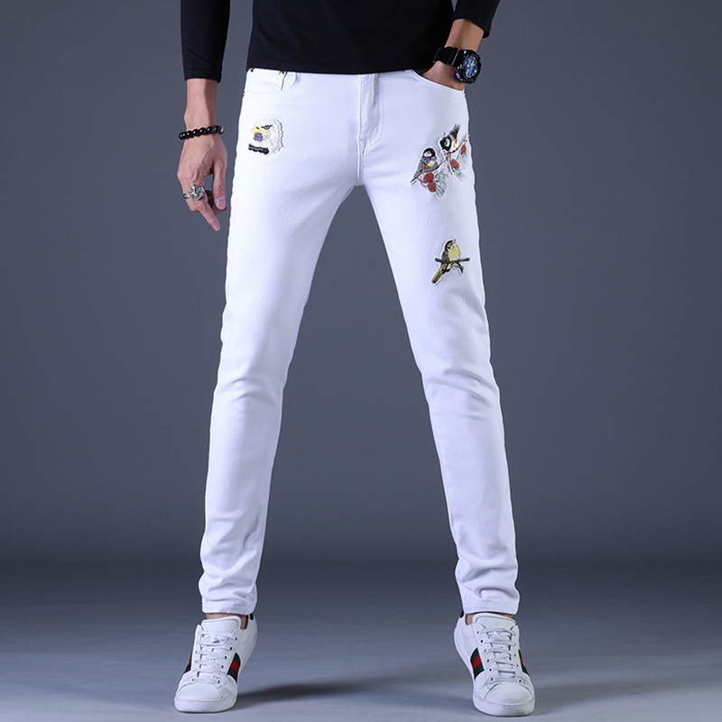 春秋季拉链徽章刺绣牛仔长裤